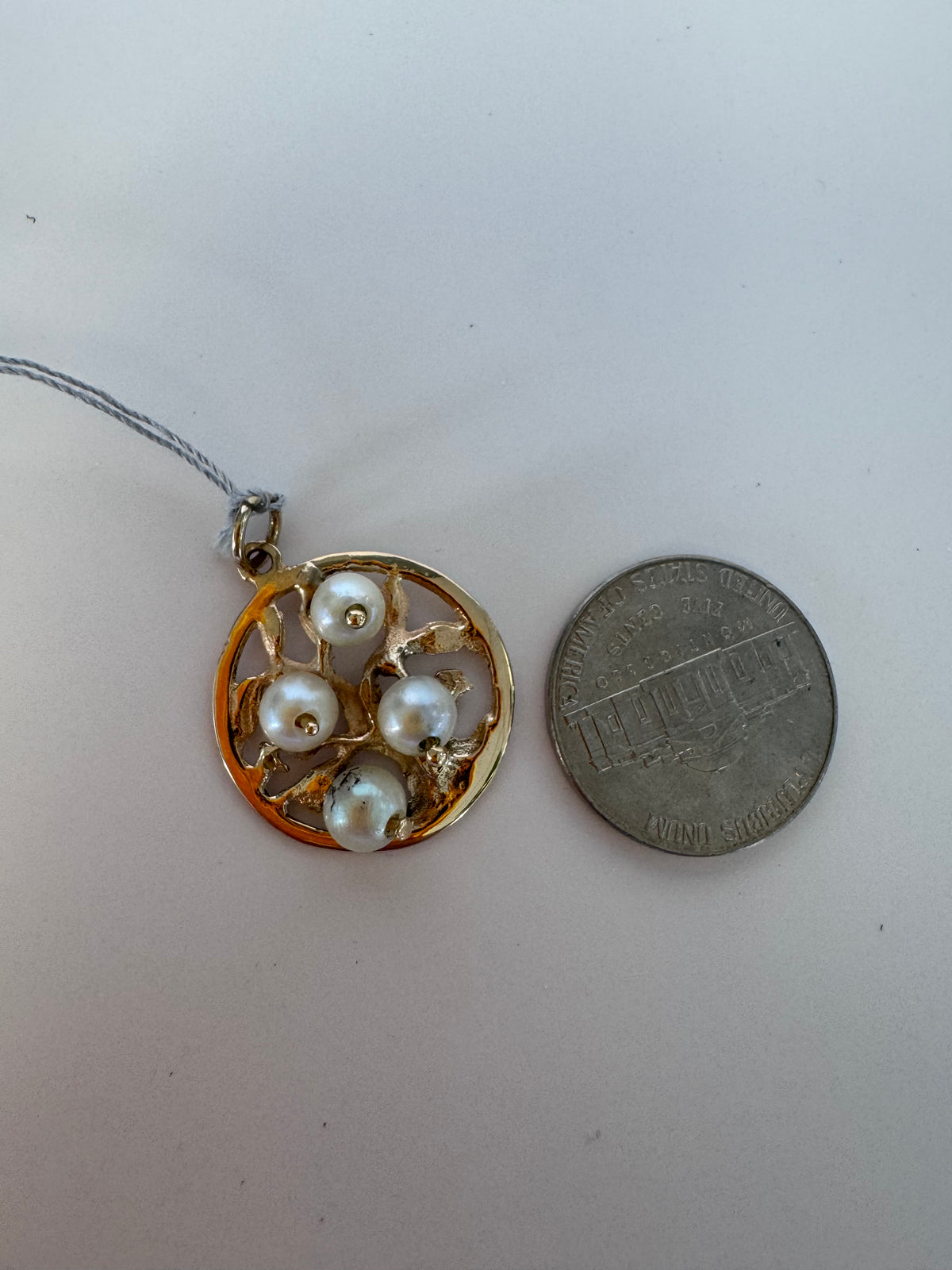 Vintage 14K gold Tree of Life pendant with four pearls set in openwork branches, estate jewelry