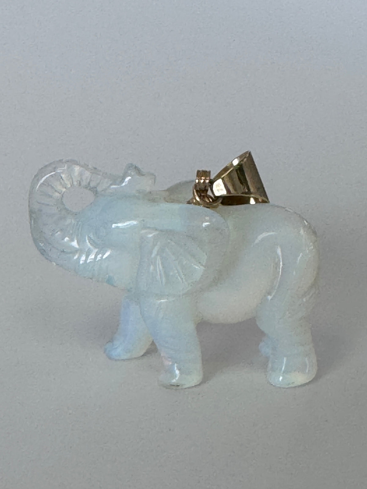 
Large hand carved opal elephant pendant with 14K gold bail, trunk up position, estate jewelry good luck charm
