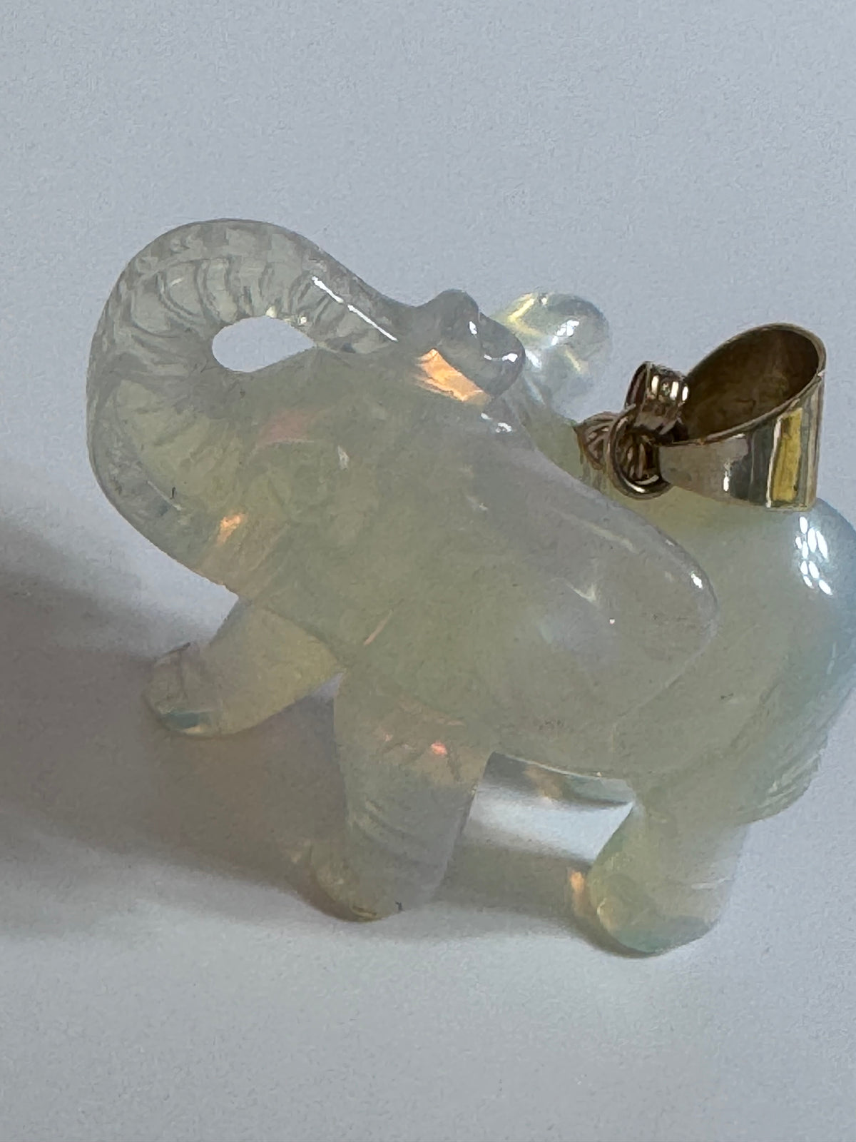 
Large hand carved opal elephant pendant with 14K gold bail, trunk up position, estate jewelry good luck charm