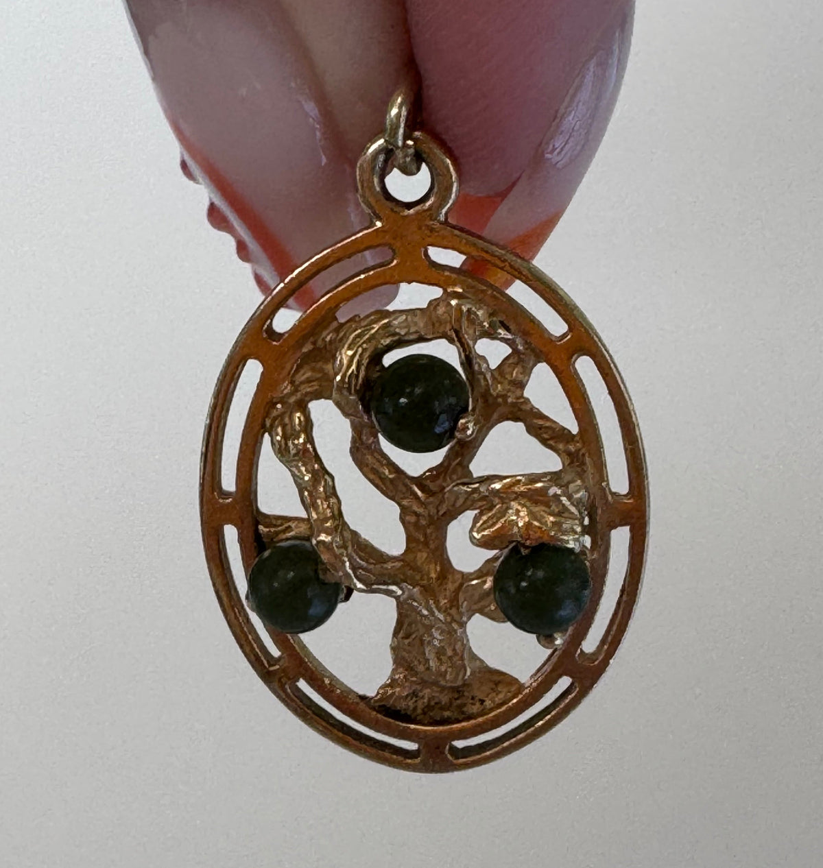 Mid century 14K gold Tree of Life charm pendant with jade accents, pierced branch design, vintage spiritual jewelry
