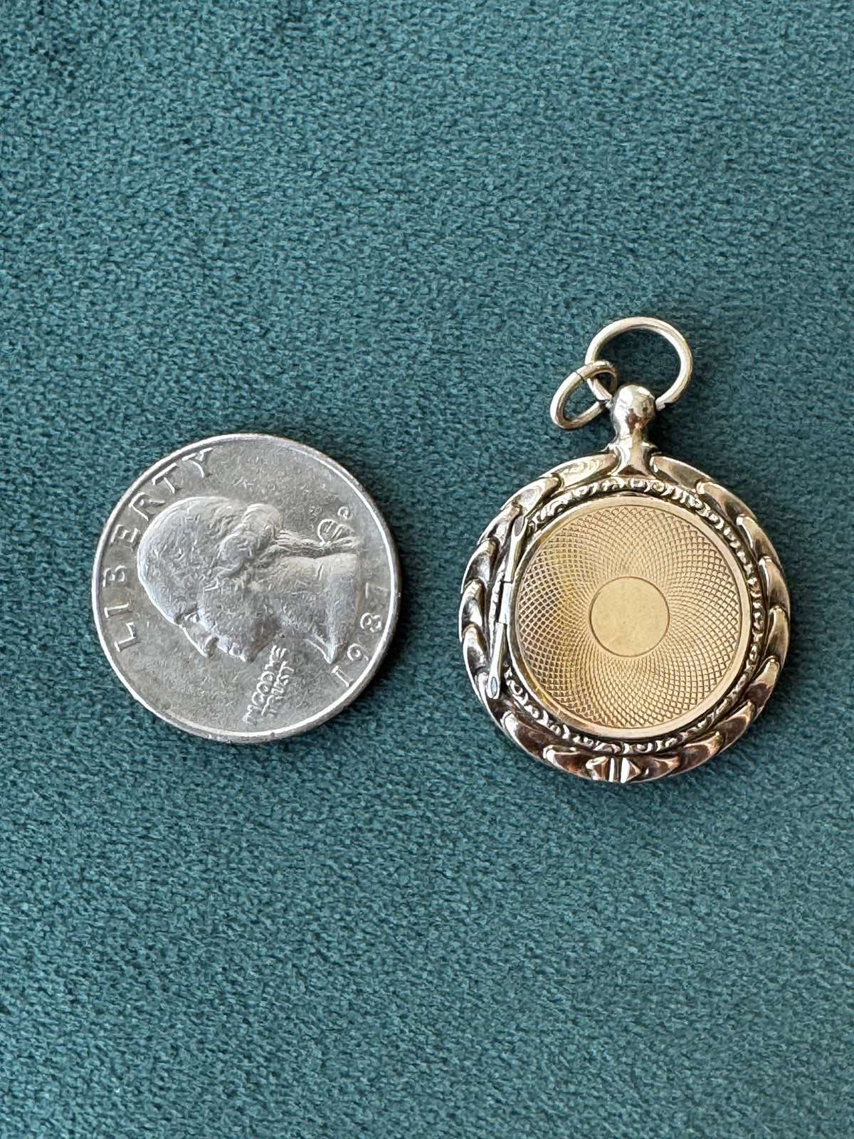 Antique 14K gold round locket with engine turned  pattern and ornate border, original Victorian photo inside