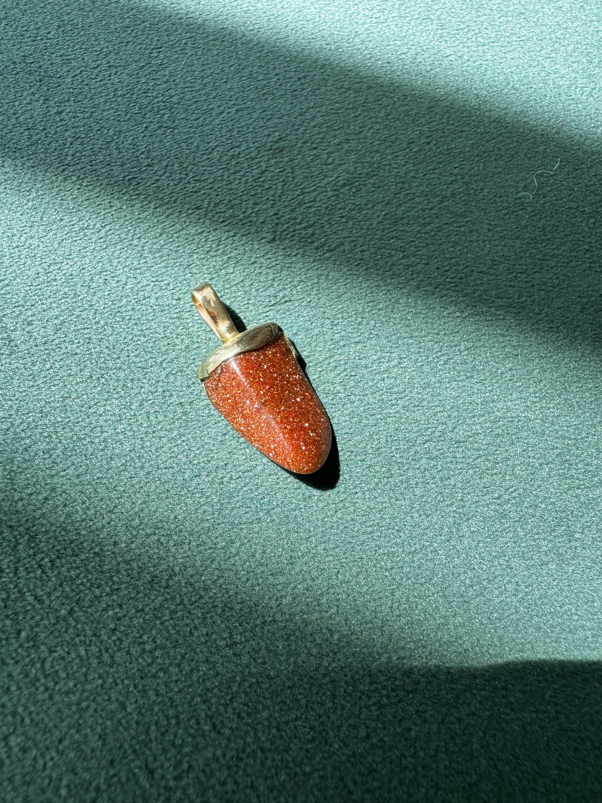 Goldstone Pendant 14K Gold Cap Flame Shape