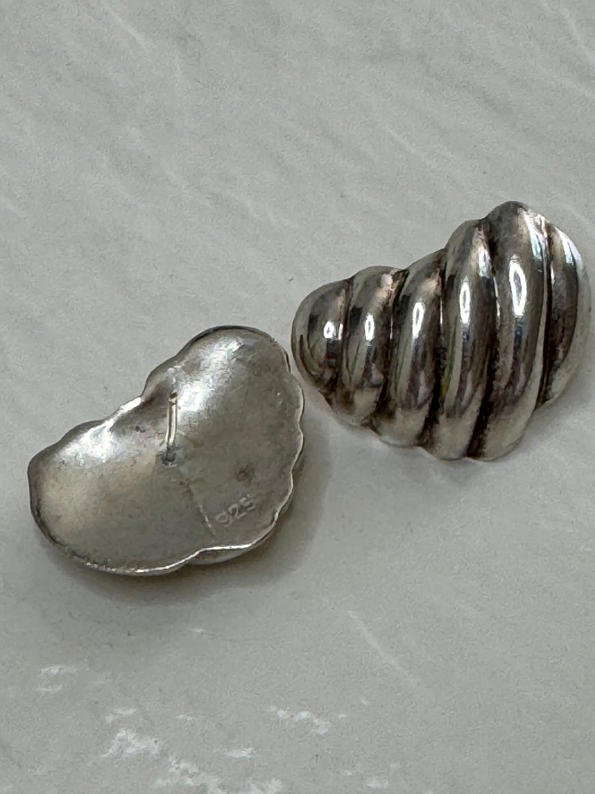 Vintage Mexican sterling silver ribbed puffy heart earrings with dimensional swirl pattern and high polish finish