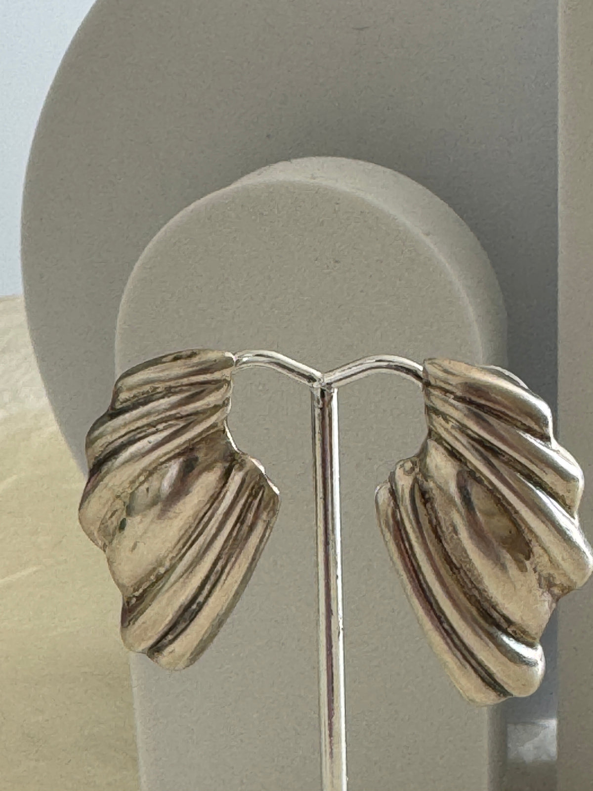 Vintage Mexican sterling silver wing post earrings with ribbed feather texture and Mexico 925 hallmarks