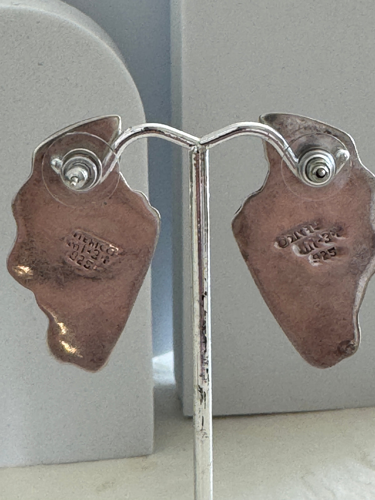 Vintage Mexican sterling silver wing post earrings with ribbed feather texture and Mexico 925 hallmarks