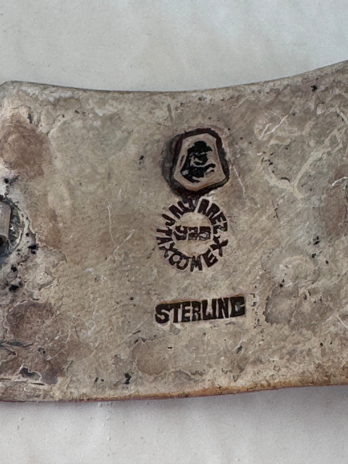 Estate J. Alvarez Taxco Mexican sterling silver storyteller panel bracelet showing detailed cultural scenes with guitar player, pottery, and folk motifs