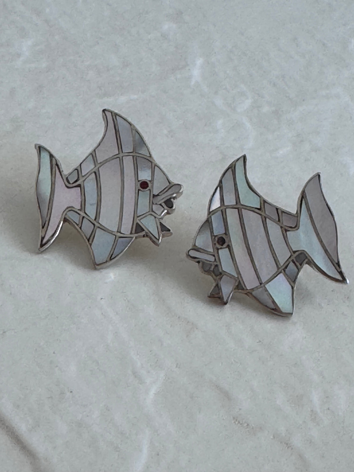 Vintage sterling silver angelfish brooches with mother of pearl mosaic inlay and red accent eyes